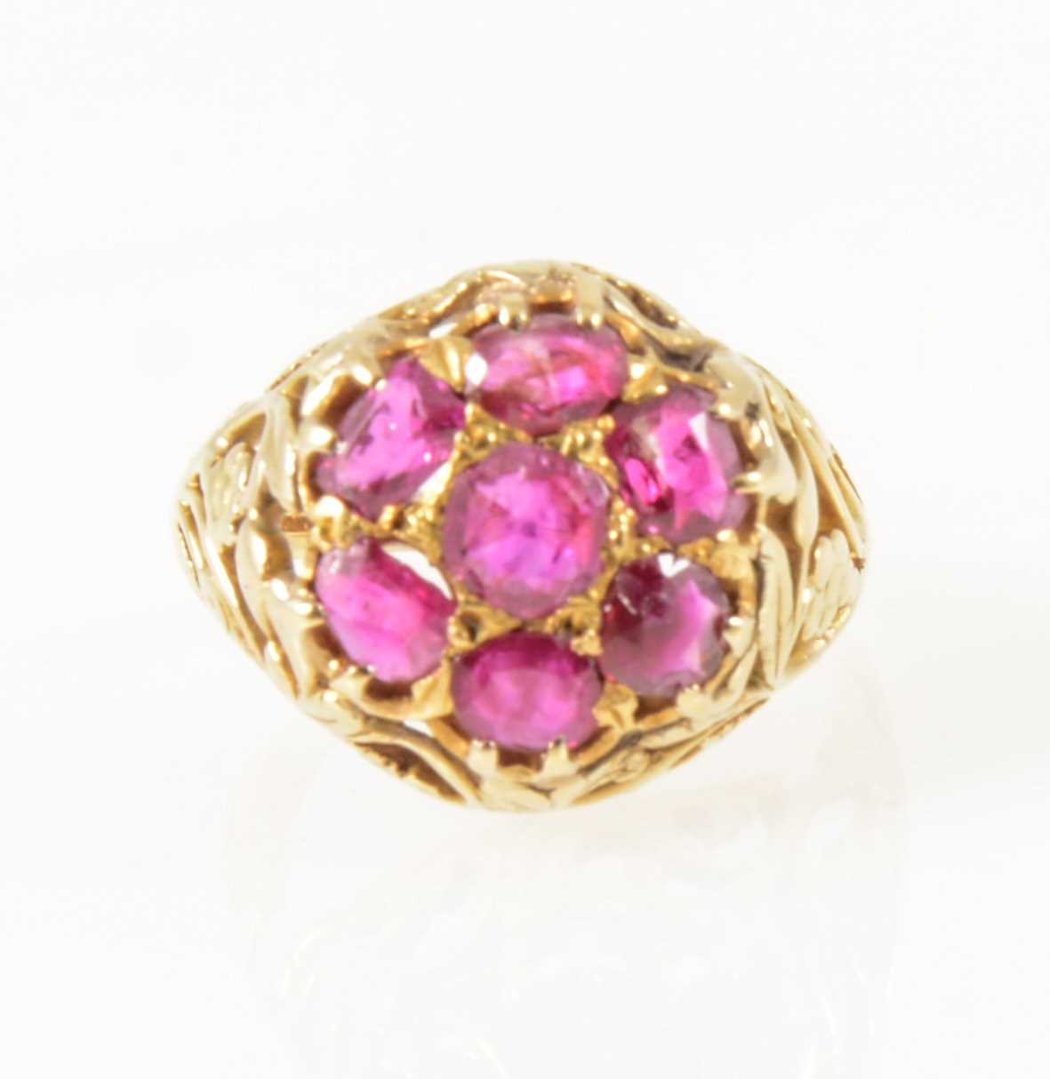 Lot 28 - A vintage ruby cluster ring.