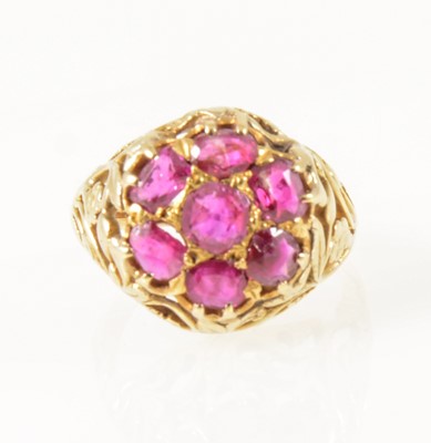 Lot 28 - A vintage ruby cluster ring.