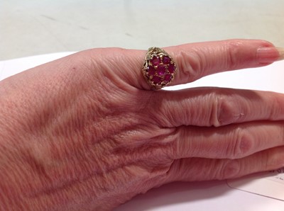 Lot 28 - A vintage ruby cluster ring.