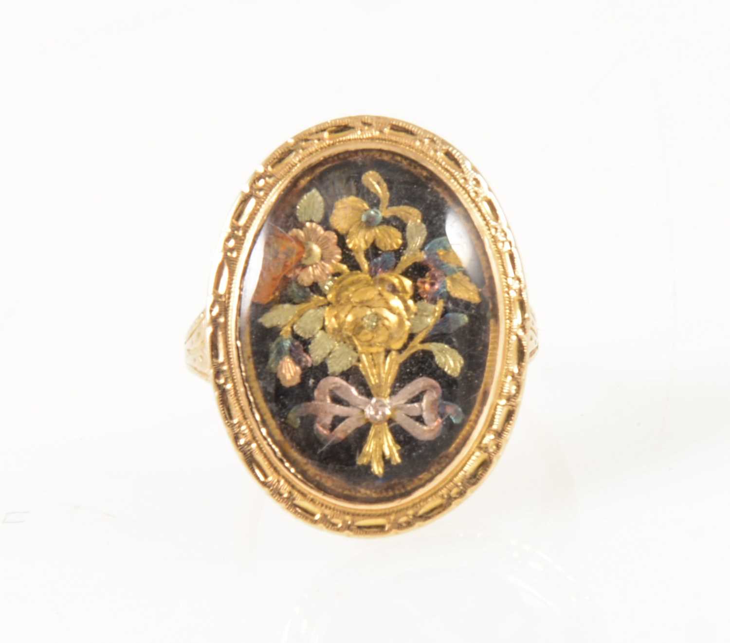 Lot 37 - A 19th Century three colour gold ring.