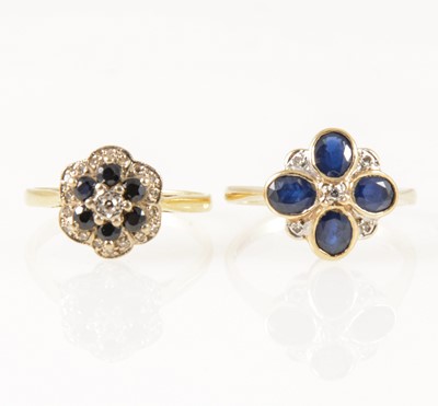 Lot 40 - Two sapphire and diamond circular cluster rings.
