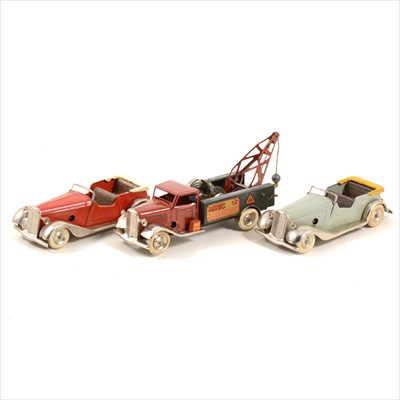 Lot 414 - Three Tri-ang Minic toys; including 48M breakdown lorry and two 12M open top sports cars.