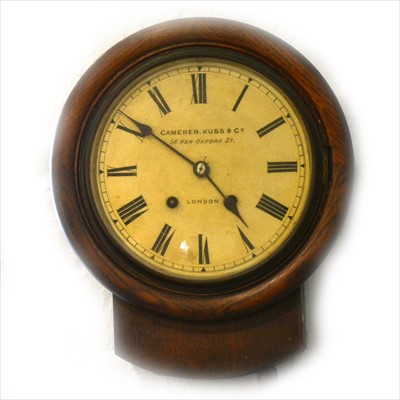 Lot 173 - A late Victorian oak wall clock, enamelled dial signed Camerer, Cuss & Co