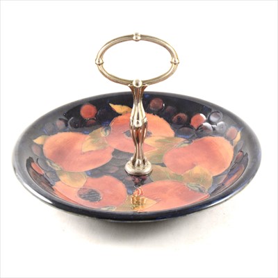 Lot 80 - William Moorcroft, a 'Pomegranate' cake plate, circa 1920