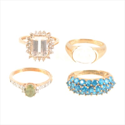Lot 201 - Four gemset rings, including a Uri Geller crystal Ankh ring.