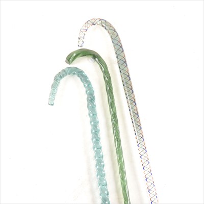 Lot 141 - A glass walking cane, double series colour twist; and two other glass walking canes