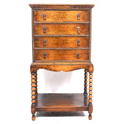 Lot 72 - An oak and stained beechwood music cabinet