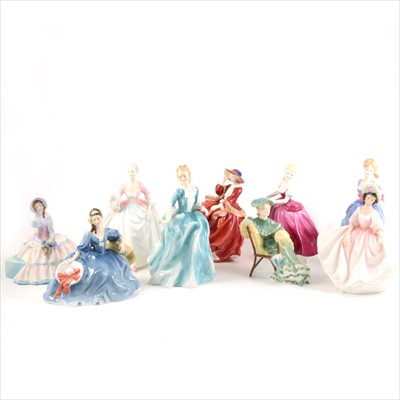 Lot 34 - Eight Royal Doulton figurines, and a Coalport figurine