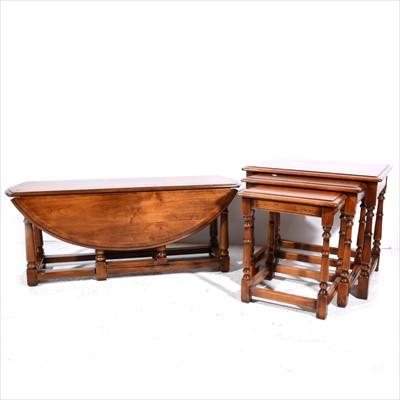 Lot 269 - A set of three contemporary stressed wood and yew wood banded tables, Simpsons of Norfolk, and a drop-leaf occasional table.