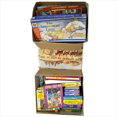 Lot 323 - Puzzles and boardgames; a large collection of vintage puzzles, including TV and film related titles, boardgames and other games.