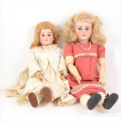Lot 380 - Two Germany bisque head dolls; Schoenau & Hoffmeister and an unmarked doll.