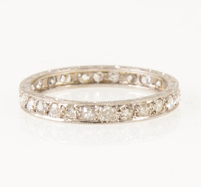 Lot 15 - A diamond full eternity ring.