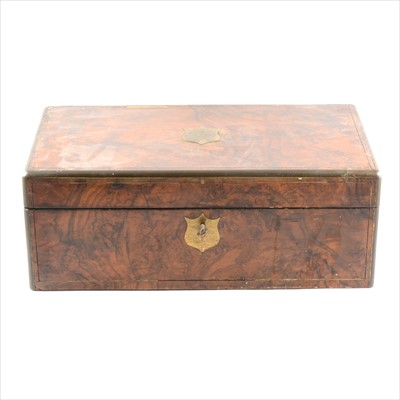 Lot 115 - A Victorian walnut writing box, brass outlines