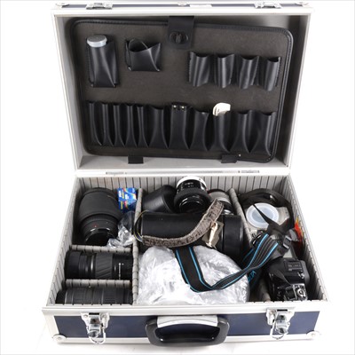Lot 119 - Minolta SLR camera, with good selection of camera lenses and hard carry case.