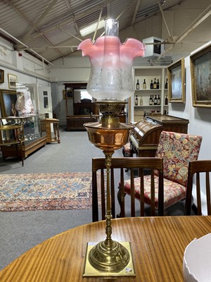 Lot 516 - A brass and copper oil lamp, by W. A. S. Benson