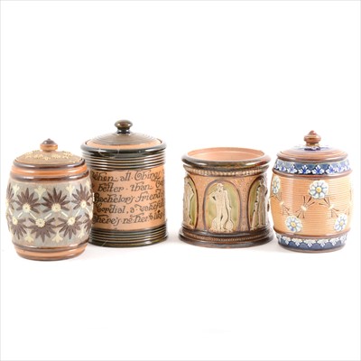 Lot 9 - Four Doulton Lambeth tobacco jars, including a John Broad Cricketers jar