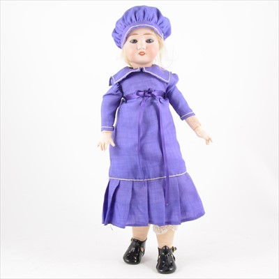 Lot 403 - A French bisque head doll, purple dress and bonnet.