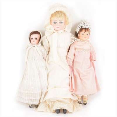 Lot 394 - Three composition dolls; all are unmarked