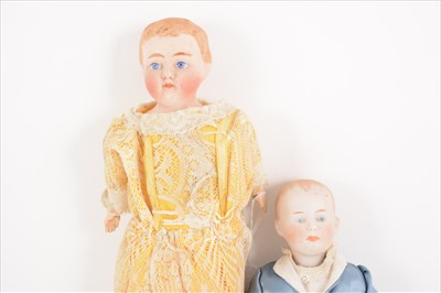 Lot 395 - Three bisque head and composition head boy dolls; a Gebrüder Heubach and two other.