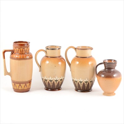 Lot 29 - Four Doulton Lambeth stoneware jugs