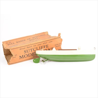 Lot 426 - Sutcliffe model sailing yacht boat; pre-wear green and cream, with early German made motor, c1920s