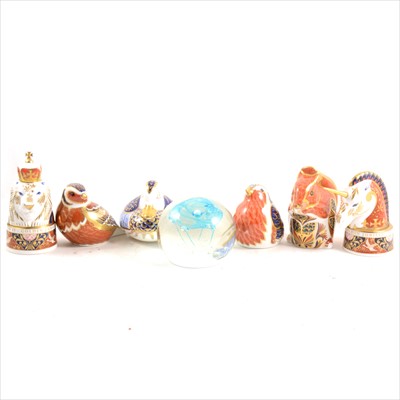 Lot 30A - Four Royal Crown Derby paperweights, pair of Worcester Lion and Unicorn candle snuffers, and a Caithness paperweight.