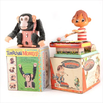 Lot 441 - Two Japanese battery operated toys; Pinocchio and Tumbling Monkey, tin-plate and plastic.
