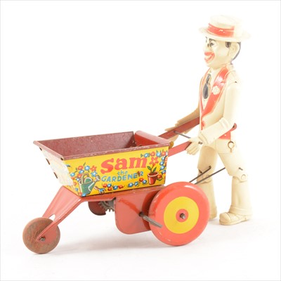 Lot 434 - Louis Marx Sam the Gardner tin-plate and plastic toy, 21cm long.