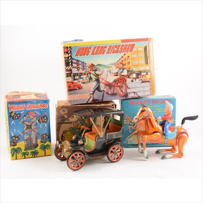 Lot 420 - Four Tin-plate and plastic toys, including Daiya Japan Bucking Bronco and others.