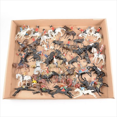Lot 357 - Lead painted figures; approximately 42 mounted horse figures, Scots Guards, racing horses and other wars, Britains and other makers, (some re-painting).
