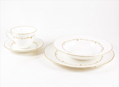 Lot 60 - A Royal Worcester bone china table service, 'Gold Chantilly' pattern
