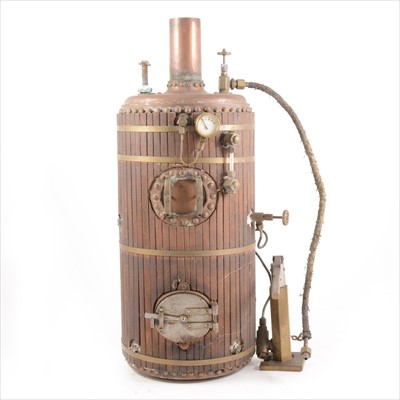 Lot 11 - A well built vertical upright live steam boiler engine; with wooden planking and brass bands