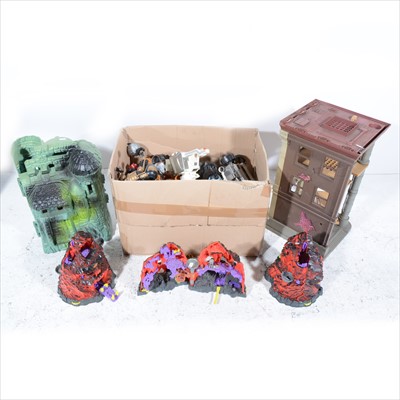 Lot 335 - 1980s plastic toys; a collection including He-Man Skull castle, Mighty Max, Ghostbusters station, vehicles, figures and parts, (all a/f).