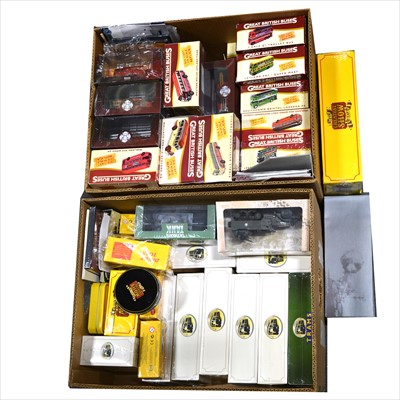 Lot 238 - Two boxes of modern Atlas die-cast models, including Great British Buses, The Greatest Show, Atlas Dinky Toys, Tanks and others.