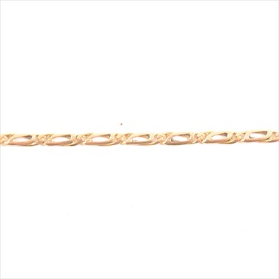 Lot 187 - A yellow metal link bracelet.