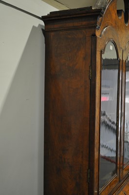 Lot 293 - A George II walnut bureau bookcase