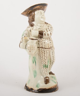Lot 13 - A Pearlware type earthenware 'Hearty Goodfellow' Toby jug, early 19th centur