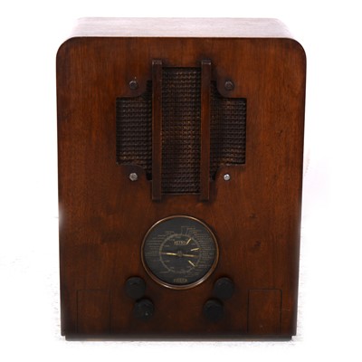 Lot 61 - Lissen valve radio in stained oak ply case, serial number LN8113 10982, fitted valves, Magnavox speaker, 47cm tall.