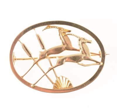 Lot 76 - Geoffrey Bellamy for Ivan Tarratt  a 9 carat yellow gold leaping gazelle brooch.