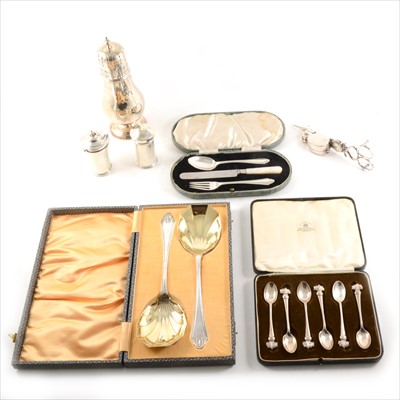 Lot 168 - A silver sugar caster, set of silver coffee spoons, christening set