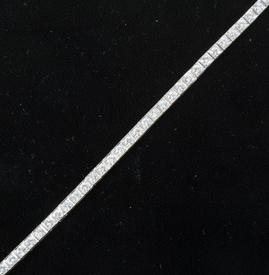 Lot 82 - A diamond line bracelet..
