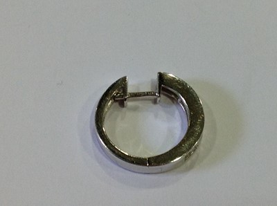 Lot 53 - A pair of diamond hoop earrings.