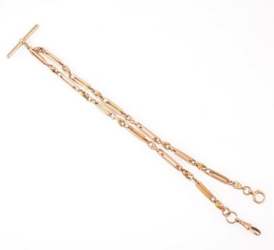 Lot 142 - A 9 carat rose gold  double albert watch chain