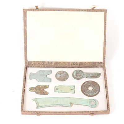 Lot 162 - A collection of seven Chinese archaic style cast metal artefacts