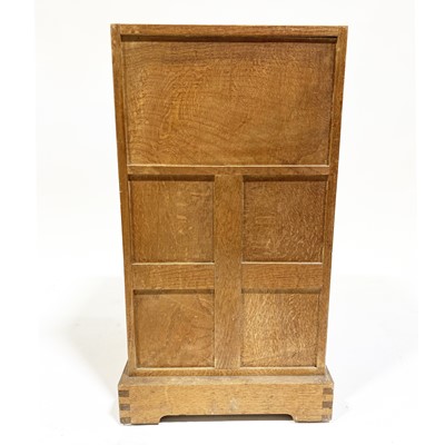 Lot 534 - An Arts and Crafts oak bedside pedestal cupboard, by Peter van der Waals for Claude Biddulph