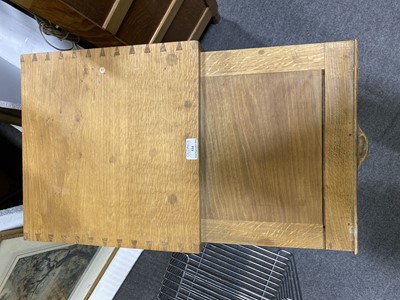 Lot 534 - An Arts and Crafts oak bedside pedestal cupboard, by Peter van der Waals for Claude Biddulph
