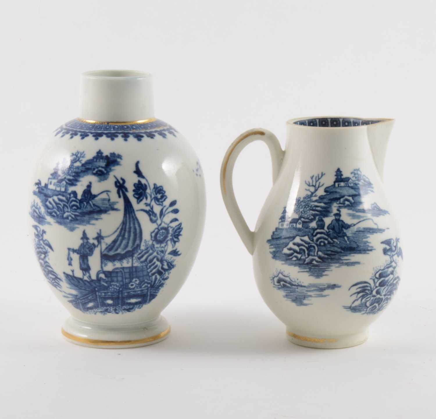 Lot 16 - A Caughley blue and white sparrow beak jug and a First Period Worcester tea caddy