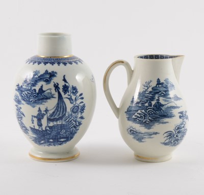 Lot 16 - A Caughley blue and white sparrow beak jug and a First Period Worcester tea caddy
