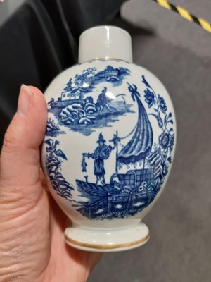 Lot 16 - A Caughley blue and white sparrow beak jug and a First Period Worcester tea caddy