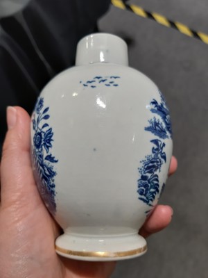 Lot 16 - A Caughley blue and white sparrow beak jug and a First Period Worcester tea caddy